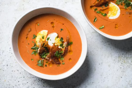 This image released by Milk Street shows a recipe for Andalusian tomato and bread soup. (Milk Street via AP)