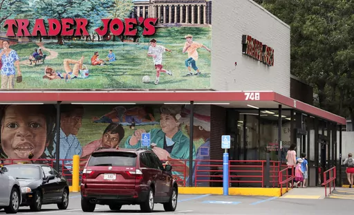 Customers walk to a Trader Joe's market, Aug. 13, 2019, in Cambridge, Mass. Trader Joe’s is recalling two of its cookie products because they may contain rocks, the grocery chain announced Friday, July 21, 2023. (AP Photo/Charles Krupa, File)
