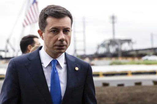 FILE -U.S. Department of Transportation Secretary Pete Buttigieg attends a groundbreaking ceremony for the New Portal North Bridge project held in Kearny, N.J., Monday, Aug 1, 2022. A group of environmental and racial justice organizations filed a lawsuit in federal court Thursday, Nov. 17, against the U.S. Department of Transportation and  Buttigieg. The lawsuit aims to halt a Gulf Coast road project that the group says will harm the environment near historic Black neighborhoods. (AP Photo/Stef