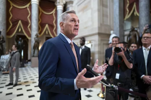 Speaker of the House Kevin McCarthy, R-Calif., talks to reporters at the Capitol in Washington, Monday, July 17, 2023. House conservatives in a group known as the Freedom Caucus have unveiled a list of demands that they want included in a stopgap spending measure to keep the federal government running after the end of September. It's a smorgasbord of non-starters for the Democratic-controlled Senate and the White House, signaling the challenges McCarthy will face next month to get a bill passed 