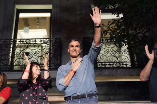 Socialist Workers' Party leader and current Prime Minster Pedro Sanchez greets supporters outside the party's headquarters in Madrid, Spain, Sunday, July 23, 2023. Ballots from Spaniards living abroad were counted Friday, July 28, and they gave a new twist to the inconclusive results from the general election. The conservative Popular Party gained an additional seat from Madrid’s constituency late in the day at the expense of the Socialist Workers’ Party. (AP Photo/Emilio Morenatti, File)