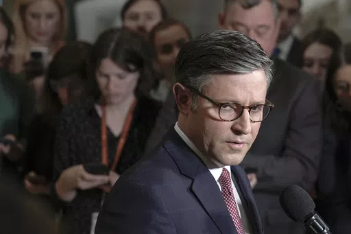 Speaker of the House Mike Johnson, R-La., right, speaks with reporters to discuss his proposal of sending crucial bipartisan support to aid Ukraine, Israel and Taiwan after weeks of inaction on Capitol Hill Wednesday, April 17, 2024, in Washington. (AP Photo/Mariam Zuhaib)