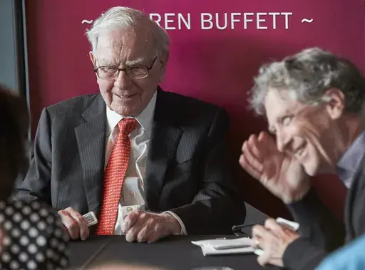 Warren Buffett, Chairman and CEO of Berkshire Hathaway, left, plays bridge with Bill Gates, following the annual Berkshire Hathaway shareholders meeting on May 5, 2019 in Omaha, Neb. (AP Photo/Nati Harnik, File)