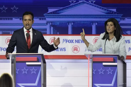 Businessman Vivek Ramaswamy, left, and former U.N. Ambassador Nikki Haley speak during a Republican presidential primary debate hosted by FOX News Channel, Aug. 23, 2023, in Milwaukee. Ramaswamy and Haley, two of the leading contenders for the Republican presidential nomination, are Indian Americans, even though polling points to an Indian diaspora that overwhelmingly votes Democrat. The two candidates are running significantly behind former President Donald Trump and also trail Florida Gov. Ron