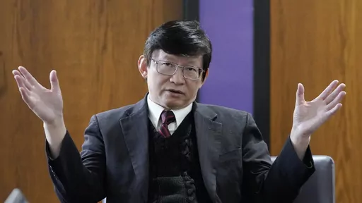 Taowen Le, a Weber State University professor of information systems and technologies, speaks during an interview at Weber State University on Oct. 11, 2022, in Ogden, Utah. An investigation by the Associated Press has found that China and its U.S.-based advocates spent years building relationships with the Utah's officials and lawmakers. (AP Photo/Rick Bowmer)