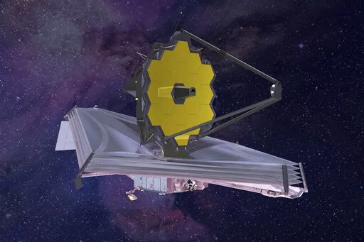 This 2015 artist's rendering provided by Northrop Grumman via NASA shows the James Webb Space Telescope. On Monday, Jan. 24, 2022, the world’s biggest and most powerful space telescope reached its final destination 1 million miles away, one month after launching on a quest to behold the dawn of the universe. (Northrop Grumman/NASA via AP)