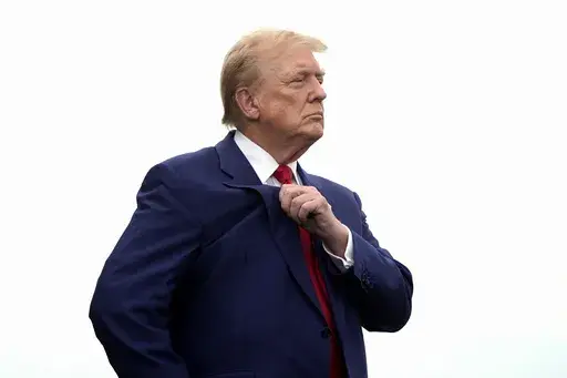 Republican presidential nominee former President Donald Trump arrives to speak during a news conference held at Trump National Golf Club Los Angeles in Rancho Palos Verdes, Calif., Friday, Sept. 13, 2024. (AP Photo/Jae C. Hong)