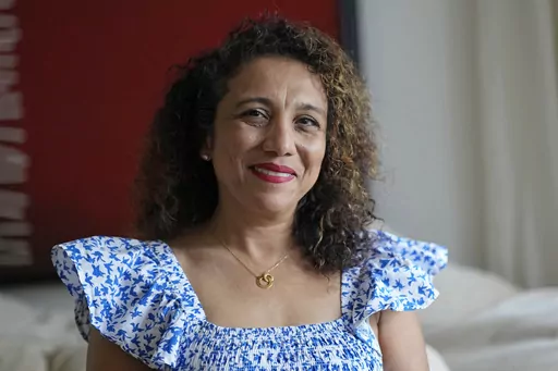 Monica Fulton poses at her home Monday, Nov. 20, 2023, in Houston. Fulton prioritizes giving to organizations that serve the city's residents, like the food bank, a homeless shelter and an arts education organization. The Tuesday after Thanksgiving, GivingTuesday started in 2012 as a hashtag and it has become a central part of nonprofit fundraising. (AP Photo/David J. Phillip)