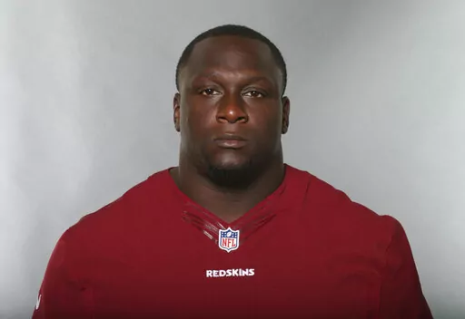 Jerrell Powe, of the Washington Redskins, poses for a photo in June 2016. Powe, a former University of Mississippi and NFL football player has been arrested in Mississippi on kidnapping charges. He remained jailed Monday, Jan. 16, 2023, in the Jackson, Miss., suburb of Ridgeland, Miss., with no bail set. It is unclear if he has a lawyer to speak for him. (AP Photo, File)