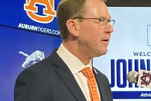 New Auburn Athletic Director John Cohen speaks during a press conference in Auburn, Ala., Tuesday, Nov. 8, 2022. (AP Photo/John Zenor)
