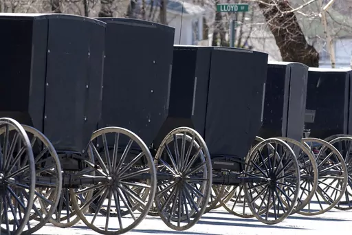 This April 10, 2002 photo shows Amish buggies of the Swartzentrubers Amish sect parked outside the Ebensburg, Pa., courthouse. A state appeals court says members of a deeply conservative Amish community in Minnesota don’t need to install septic systems to dispose of their “gray water.” The ruling came Monday, July 10, 2023 from the state Court of Appeals in a long-running religious freedom case that went all the way up to the U.S. Supreme Court. (Pete Vizza/The Tribune-Democrat via AP, fil