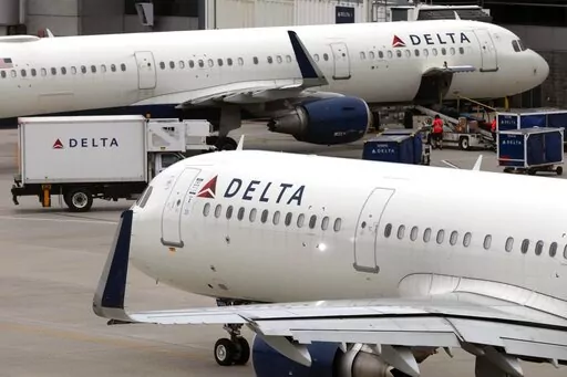 Delta Air Lines plane leaves the gate, Monday, July 12, 2021, at Logan International Airport in Boston.  Delta Air Lines has requested that the U.S. Department of Justice put any person convicted of a disruption on board a flight to the national “no fly” list. In a letter to the Justice Department Attorney General Merrick Garland dated Thursday, Feb. 3, 2022, Delta CEO Ed Bastian said there should be “zero tolerance” for any behavior that affects flight safety.  (AP Photo/Michael Dwyer)
