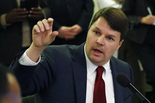 Cliff Johnson, director of the Roderick and Solange MacArthur Justice Center at the University of Mississippi School of Law, is shown speaking to state lawmakers about prisons in this Feb. 13, 2020 file photograph, at the Mississippi State Capitol. A report released by the center on Jan. 12, 2022, says thousands of people in Mississippi are held in county jails for long periods while waiting to go on trial because they are too poor to afford bail, judges may deny bail altogether or public defend