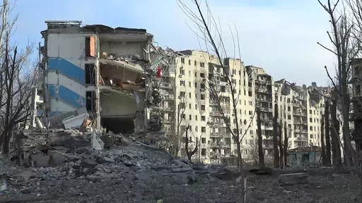 This photo taken from video released by the head of the Russian-controlled Donetsk region Denis Pushilin's telegram channel on Saturday, Feb. 24, 2024, shows damaged buildings, after Russian forces completed their takeover of Avdiivka, eastern Ukraine. Russian-controlled Donetsk region. (Head of the Russian-controlled Donetsk region Denis Pushilin telegram channel via AP)