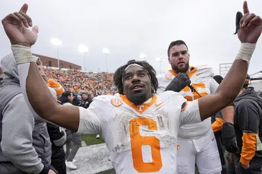 Tennessee running back Dylan Sampson (6) celebrates the team's 36-23 win against Vanderbilt after an NCAA college football game Saturday, Nov. 30, 2024, in Nashville, Tenn. (AP Photo/George Walker IV)