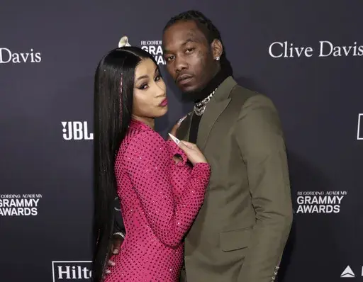 Cardi B, left, and Offset arrive at the Pre-Grammy Gala And Salute To Industry Icons in Beverly Hills, Calif. on Jan. 25, 2020. (Photo by Mark Von Holden/Invision/AP, File)
