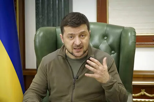 In this image from video provided by the Ukrainian Presidential Press Office and posted on Facebook early Saturday, March 12, 2022, Ukrainian President Volodymyr Zelenskyy speaks in Kyiv, Ukraine. (Ukrainian Presidential Press Office via AP)