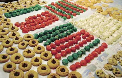 Cookies cool on a table on Saturday, Dec. 21, 2013, in Enid, Okla. Holiday meals may be changing for millions of Americans struggling with obesity and taking a new generation of weight-loss drugs in 2023. Experts and consumers say the drugs are shifting dining habits and social norms around food-centric holidays like Thanksgiving, Passover and Christmas. (Bonnie Vculek/The Enid News & Eagle via AP, File)