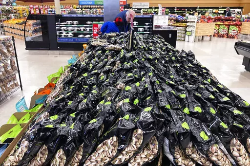 Bags of Pistachios are displayed at a grocery store in Mount Prospect, Ill., on, April 1, 2022. Consumer prices surged 8.6% last month from 12 months earlier, faster than April’s year-over-year surge of 8.3%, the Labor Department said Friday, June 10, 2022. (AP Photo/Nam Y. Huh)