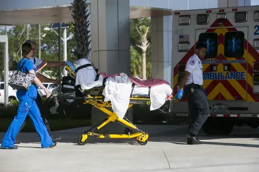 Patients are evacuated from Palms of Pasadena Hospital in South Pasadena, Fla. on Friday, Sept. 8, 2017, as Hurricane Irma approaches. (Eve Edelheit/Tampa Bay Times via AP, File)