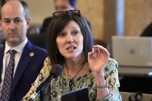 Mississippi House Medicaid Committee Chairwoman Rep. Missy McGee, R-Hattiesburg, right, asks a question of the representatives from the Hilltop Institute, a nonpartisan research organization, unseen, who presented a brief on the economic impact of Medicaid expansion in Mississippi, to the committee, media and lobbyists at the state Capitol in Jackson, Miss., Tuesday, Feb 20, 2024. Committee member State Rep. Clay Mansell, R-Clinton, left, was among the legislators who attended the briefing. (AP 
