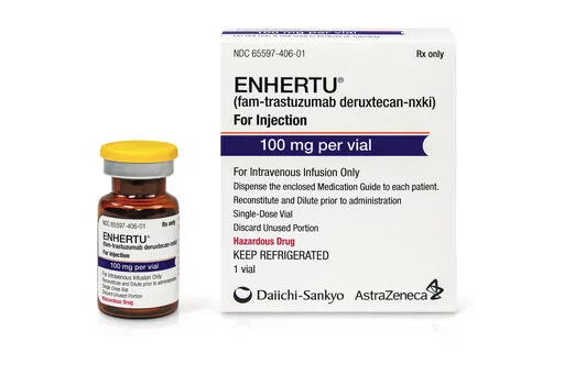 This undated photo provided by Daiichi Sankyo and AstraZeneca in June 2022 shows a vial and packaging for their Enhertu, an antibody-chemotherapy drug administered intravenously.  (Daiichi Sankyo, AstraZeneca via AP)