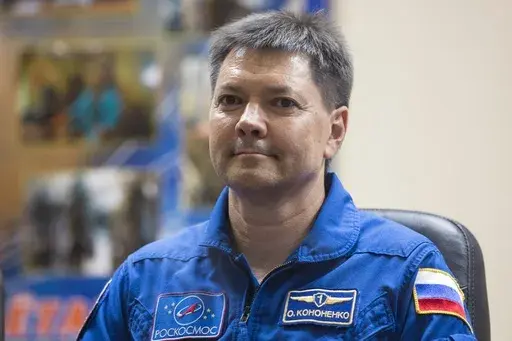 FILE _ Russian cosmonaut Oleg Kononenko, a crew member of the next mission to the International Space Station, attends a news conference at the Russian leased Baikonur Cosmodrome, in Kazakhstan, on July 21, 2015. The 59-year-old Russian cosmonaut has become the first person to spend 1000 days in space, Russian space agency Roscosmos said Wednesday, June 5, 2024. Kononenko achieved the milestone on Tuesday, having made five journeys to the International Space Station dating back to 2008. (AP Phot