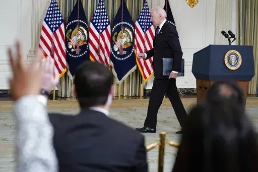 President Joe Biden departs after speaking about the October jobs report from the State Dining Room of the White House, Nov. 5, 2021, in Washington. As President Joe Biden wraps up his first year in the White House, he has held fewer news conferences than any of  his five immediate predecessors at the same point in their presidencies, and has taken part in fewer media interviews than any of his recent predecessors. That's according to new research from Towson University professor emerita Martha