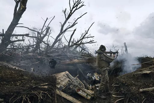 A Ukrainian soldier fires an RPG toward Russian positions at the frontline near Avdiivka, an eastern city where fierce battles against Russian forces have been taking place, in the Donetsk region, Ukraine, on April 28, 2023. Two years after Russia’s full-scale invasion captured nearly a quarter of the country, the stakes could not be higher for Kyiv. After a string of victories in the first year of the war, fortunes have turned for the Ukrainian military, which is dug in, outgunned and outnumb