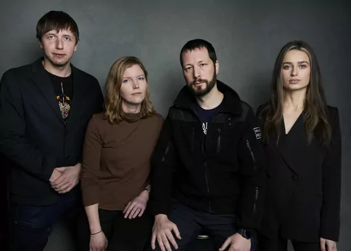 Photographer Evgeniy Maloletka, from left, "Frontline" producer/editor Michelle Mizner, director Mstyslav Chernov, and field producer Vasilisa Stepanenko pose for a portrait to promote the film "20 Days in Mariupol" at the Latinx House during the Sundance Film Festival on Sunday, Jan. 22, 2023, in Park City, Utah. The film is a joint project between The Associated Press and PBS "Frontline." (Photo by Taylor Jewell/Invision/AP, File)