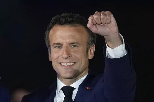 French President Emmanuel Macron celebrates with his supporters in Paris, France, Sunday, April 24, 2022. French President Emmanuel Macron's reelection has bolstered his standing as a senior player in Europe. Macron is now expected to push for strengthening the 27-nation bloc and throw all his weight behind efforts to end the war in Ukraine. (AP Photo/Christophe Ena, File)