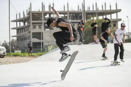 Skateboarders practice in the first skatepark of Baghdad, Iraq, Saturday, Feb. 1, 2025. (AP Photo/Anmar Khalil)