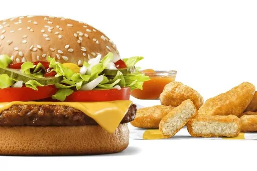 This image released by McDonald’s shows the McPlant plant-based burger and and the new plant-based McPlant Nuggets. The nuggets will be available along with the burger at McDonald’s restaurants in Germany starting Feb. 22. (McDonald’s via AP)
