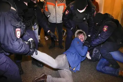 Police officers detain demonstrators in St. Petersburg, Russia, Feb. 24, 2022. When President Vladimir Putin sent troops to Ukraine, a massive wave of outrage and anti-war sentiment swept Russia. The Kremlin in response insisted that what it called a “special military operation” in Ukraine attracted overwhelming public support, and moved swiftly to suppress any dissent. (AP Photo, File)