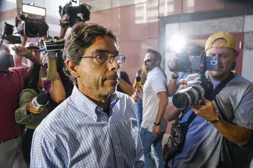 Dr. Mark Chavez, a physician from San Diego, who is charged in connection with actor Matthew Perry's death from an accidental ketamine overdose, arrives at the Roybal Federal Courthouse in Los Angeles, Friday, Aug. 30, 2024. (AP Photo/Damian Dovarganes)