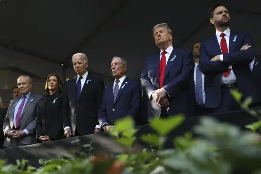 From left, Sen. Chuck Schumer, D-NY, Democratic presidential nominee Vice President Kamala Harris, President Joe Biden, Michael Bloomberg, Republican presidential nominee former President Donald Trump and Republican vice presidential nominee Sen. JD Vance, R-Ohio, attend the 9/11 Memorial ceremony on the 23rd anniversary of the Sept. 11, 2001 attacks, on Sept. 11, 2024, in New York. (AP Photo/Yuki Iwamura, File)