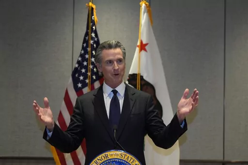 California Gov. Gavin Newsom speaks at a press conference in Beijing, Oct. 25, 2023. Newsom signed hundreds of new laws in 2023 that will take effect in California on Jan. 1, 2024. (AP Photo/Ng Han Guan,File)