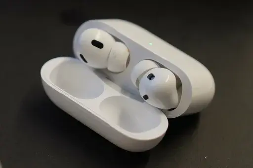 A pair of Apple AirPods Pro 2 are displayed on a table at Brooklyn College's audiology clinic in New York on Oct. 22, 2024. (AP Photo/Mary Conlon)