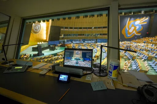 A translators booth overlooks the empty General Assembly hall at United Nations headquarters ahead of the General Assembly, Friday, Sept. 16, 2022. (AP Photo/Mary Altaffer)