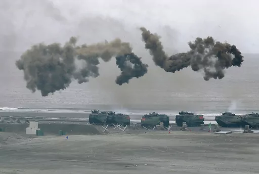 Taiwan's military holds drills of the annual Han Kuang military exercises that simulate an anti-landing operations near the coast in New Taipei City, northern Taiwan, Thursday, July 27, 2023. Taiwan military mobilized for routine defense exercises from July 24-28. The U.S. is set to announce $345 million in military aid for Taiwan, two U.S. officials said Friday. It would be the Biden administration's first major package drawing on America's own stockpiles under a new policy intended to speed up