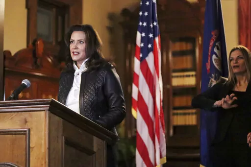 Michigan Office of the Governor, Michigan Gov. Gretchen Whitmer addresses the state during a speech in Lansing, Mich. on Oct. 8, 2020. Jurors on Friday, April 7, 2022, acquitted two men and deadlocked on two others accused of plotting to abduct Whitmer in 2020. (Michigan Office of the Governor via AP, File)