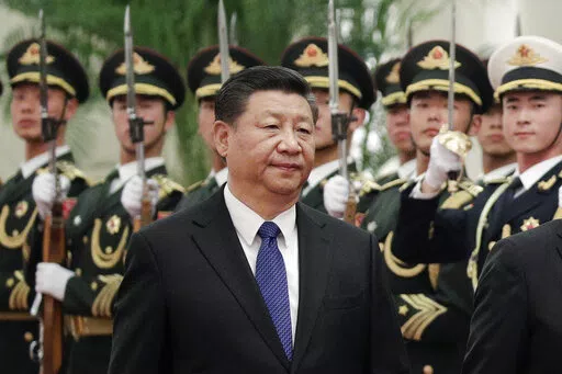 Chinese President Xi Jinping and Finnish President Sauli Niinisto (unseen) review an honor guard at the Great Hall of the People in Beijing, Monday, Jan. 14, 2019. With Russia’s military failings in Ukraine mounting, no country is paying closer attention than China to how a smaller, outgunned force has badly bloodied what was thought to be one of the world’s strongest armies. (AP Photo/Andy Wong, File)