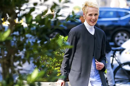 E. Jean Carroll poses for a photo, Sunday, June 23, 2019, in New York. Sexual assault victims in New York will get a one-time opportunity to sue their abusers starting Thursday under a new law expected to bring a wave of litigation against prison guards, middle managers, doctors and a few prominent figures including former President Donald Trump. (AP Photo/Craig Ruttle, File)