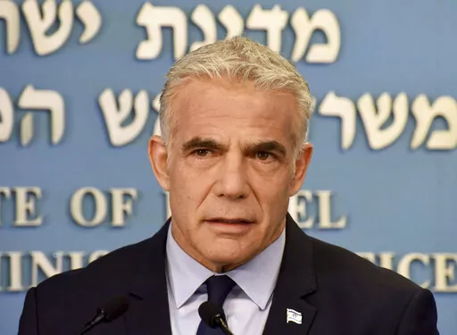 Israeli Prime Minister Yair Lapid speaks about Iran at a security briefing for the foreign press at the Prime Minister's office in Jerusalem, Wednesday, Aug. 24, 2022. Lapid called on U.S. President Joe Biden and Western powers to call off an emerging nuclear deal with Iran, saying an agreement would fail to prevent Iran from developing a nuclear bomb and reward it with billions of dollars to fund Israel's enemies. Israel's caretaker prime minister used stark language on Wednesday in his critici