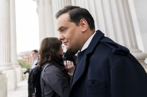 Rep. George Santos, R-N.Y., leaves the Capitol after being expelled from the House of Representatives, Friday, Dec. 1, 2023, in Washington. The House has voted to expel Santos following a critical ethics report on his conduct that included converting campaign donations for his own use, making him just the sixth member in the chamber’s history to be ousted by his colleagues. Expulsion requires support from two-third of the House. (AP Photo/Stephanie Scarbrough)